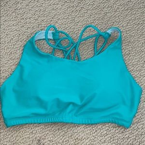 KIAVA sports bra. NEVER WORN.